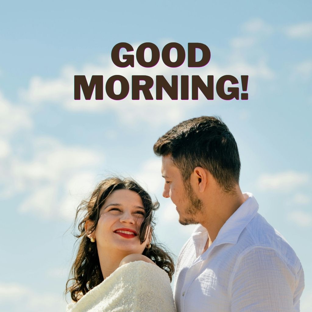 A couple embracing at sunrise, sharing a tender moment, representing love and good morning wishes for each other.