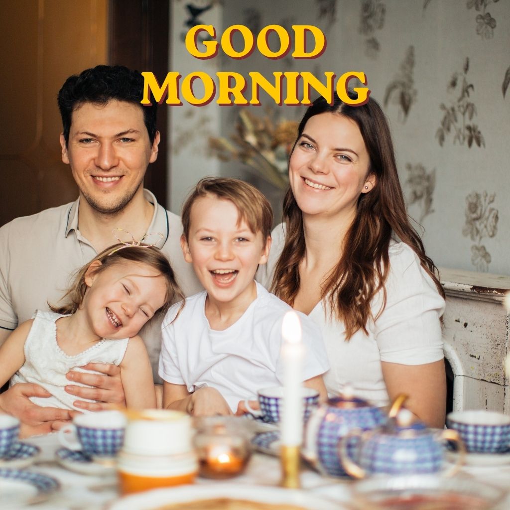 Colorful text graphic displaying "Good Morning Family!" with sun and flower illustrations.