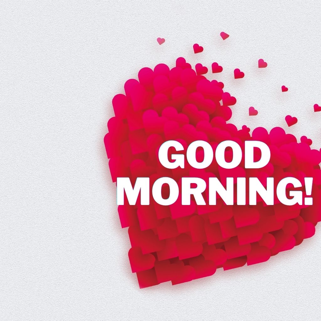 Good morning greeting with bold white “GOOD MORNING!” text over a large cluster of pink and red hearts on a white background.
