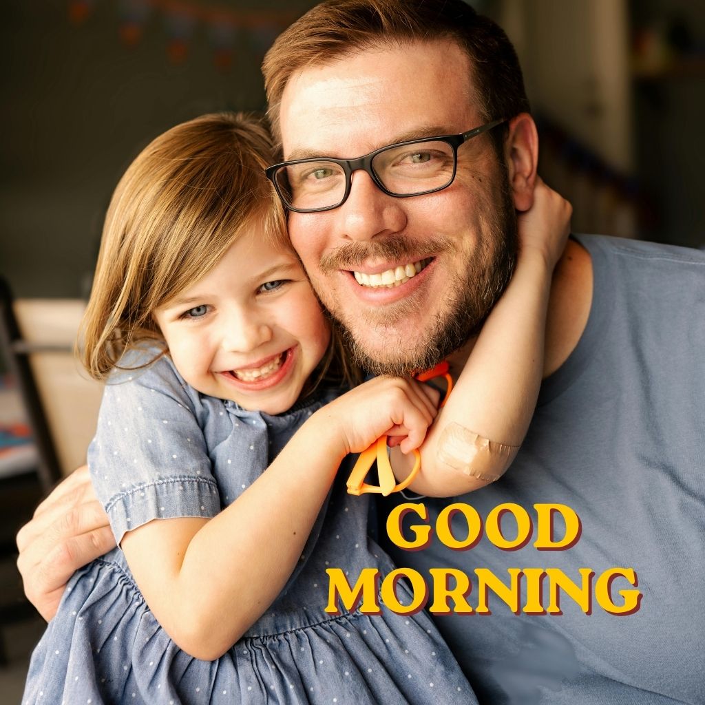 A bright sunrise with the text "Good Morning, Dad!" overlaying a scenic landscape,