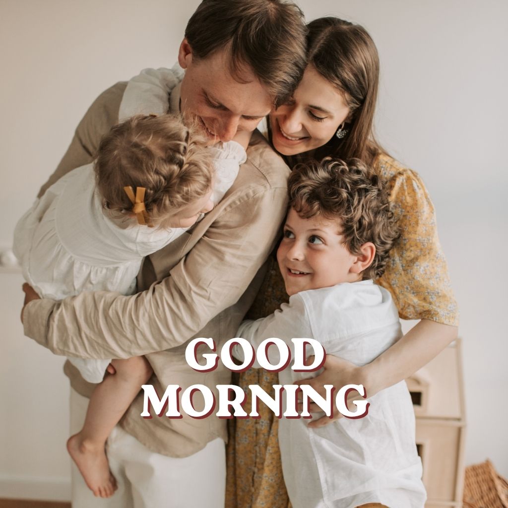 A bright sunrise illuminating a peaceful landscape with colorful flowers, conveying a cheerful good morning message.